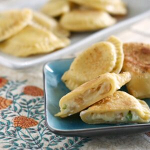Asparagus and Brie perogies on a plate