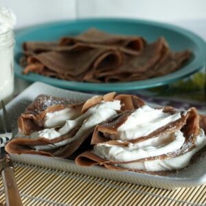 Chocolate Stout Crepes with Irish Cream Whip on a plate