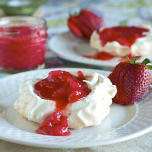 Meringue with Strawberry Rhubarb sauce on a plate