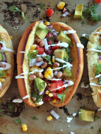 Overhead view of three Tex-Mex Hot Dogs