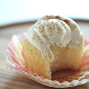 Close-up of a Vanilla Rum Cupcake with Bananas Foster Frosting with a bite removed