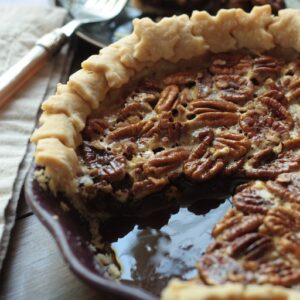 Pecan pie with a slice removed