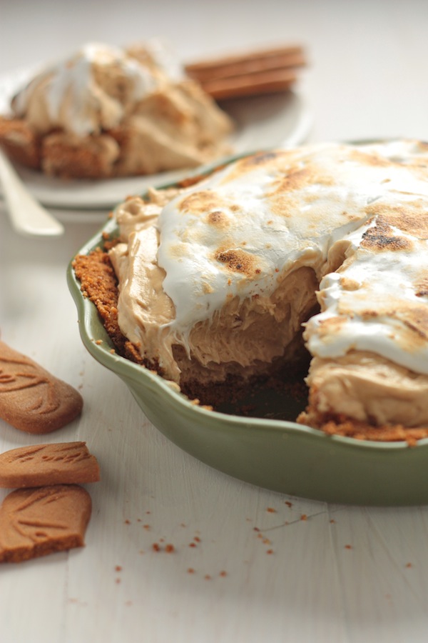 Biscoff Pie with toasted marshmallow with a slice removed