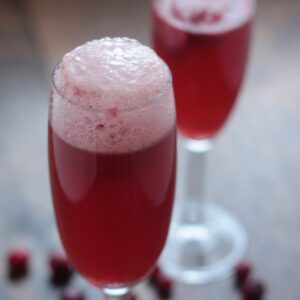 Cran-raspberry sorbet bellinis in champagne glasses