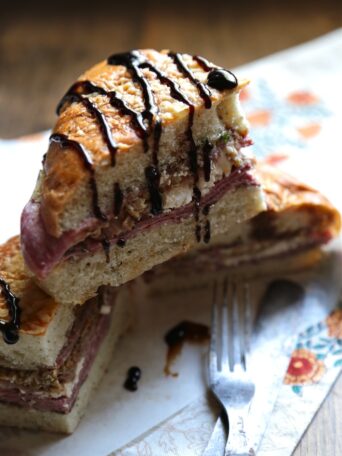 Pressed Italian Focaccia Sandwich wedges drizzled with balsamic