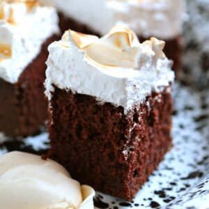 Chocolate Cake with Marshmallow Frosting - Kick that chocolate box mix to the curb with this perfectly chocolatey and moist cake!!