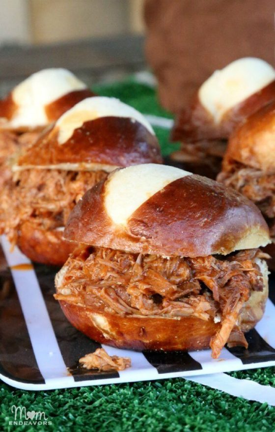 Slow Cooker Pulled Pork Pretzel Bun Sliders + 15 More Slow Cooker Appetizers for Game Day- homemadehome.com