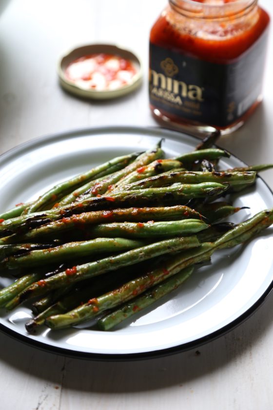 Grilled Green Beans with Harissa - a super healthy, paleo, and Whole30 friendly way to enjoy the best that summer has to offer!