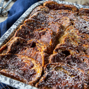 A baking sheet with baked apple french toast