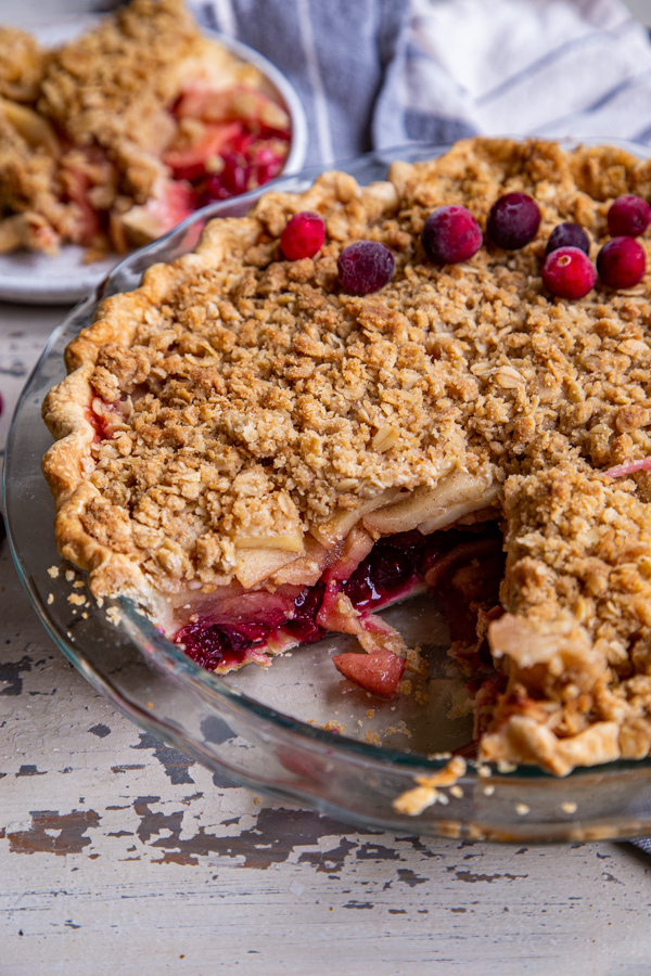 Whole Cranberry Dutch Apple Pie with slice removed